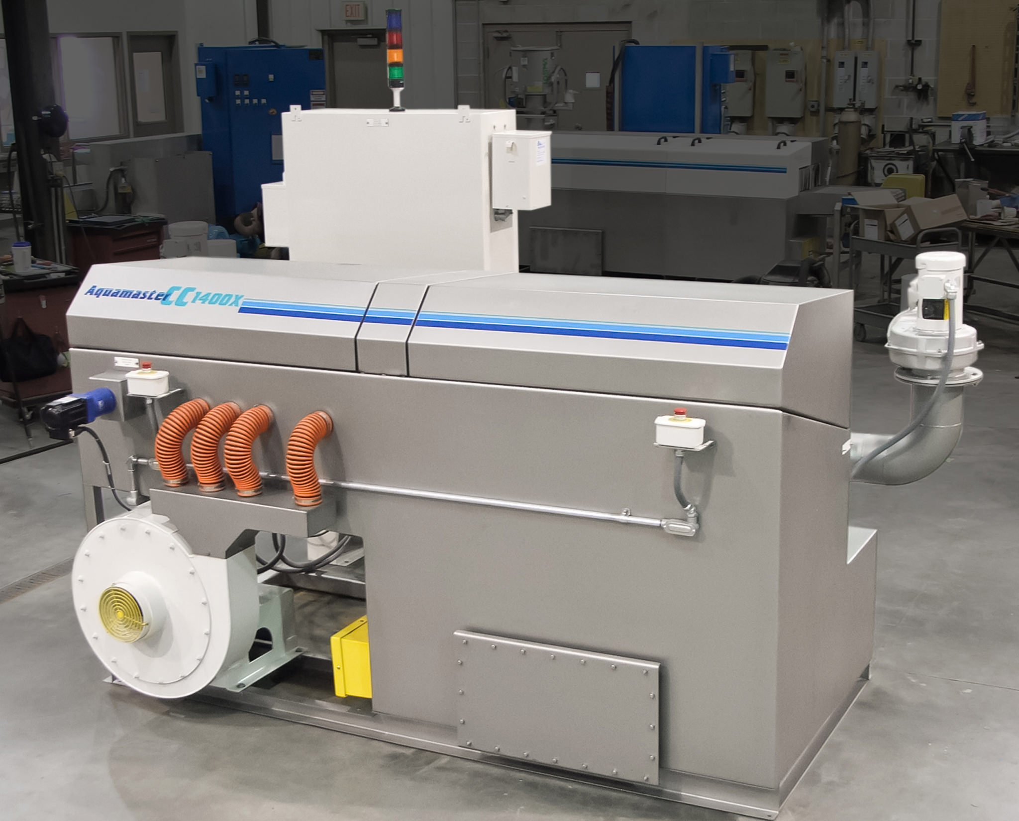 Oscillating parts wash station for front differential carriers