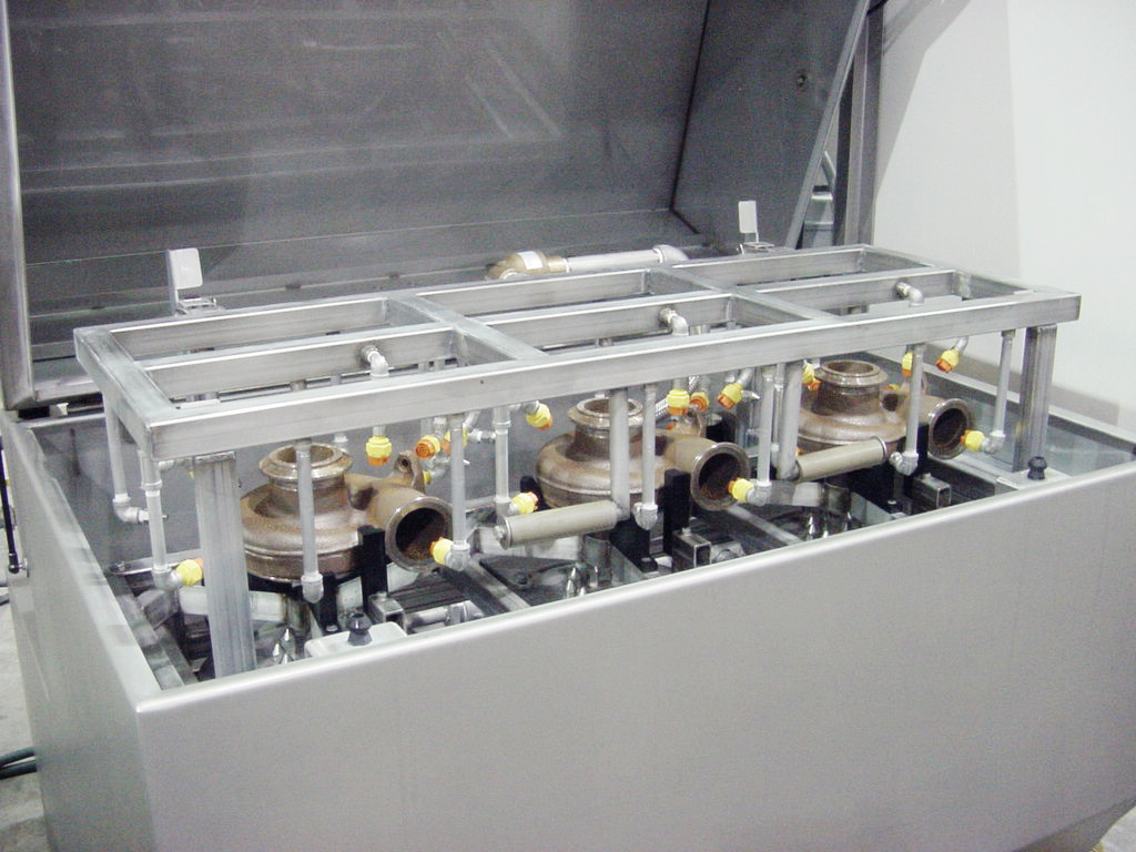 Stationary fixture washer for turbine housings