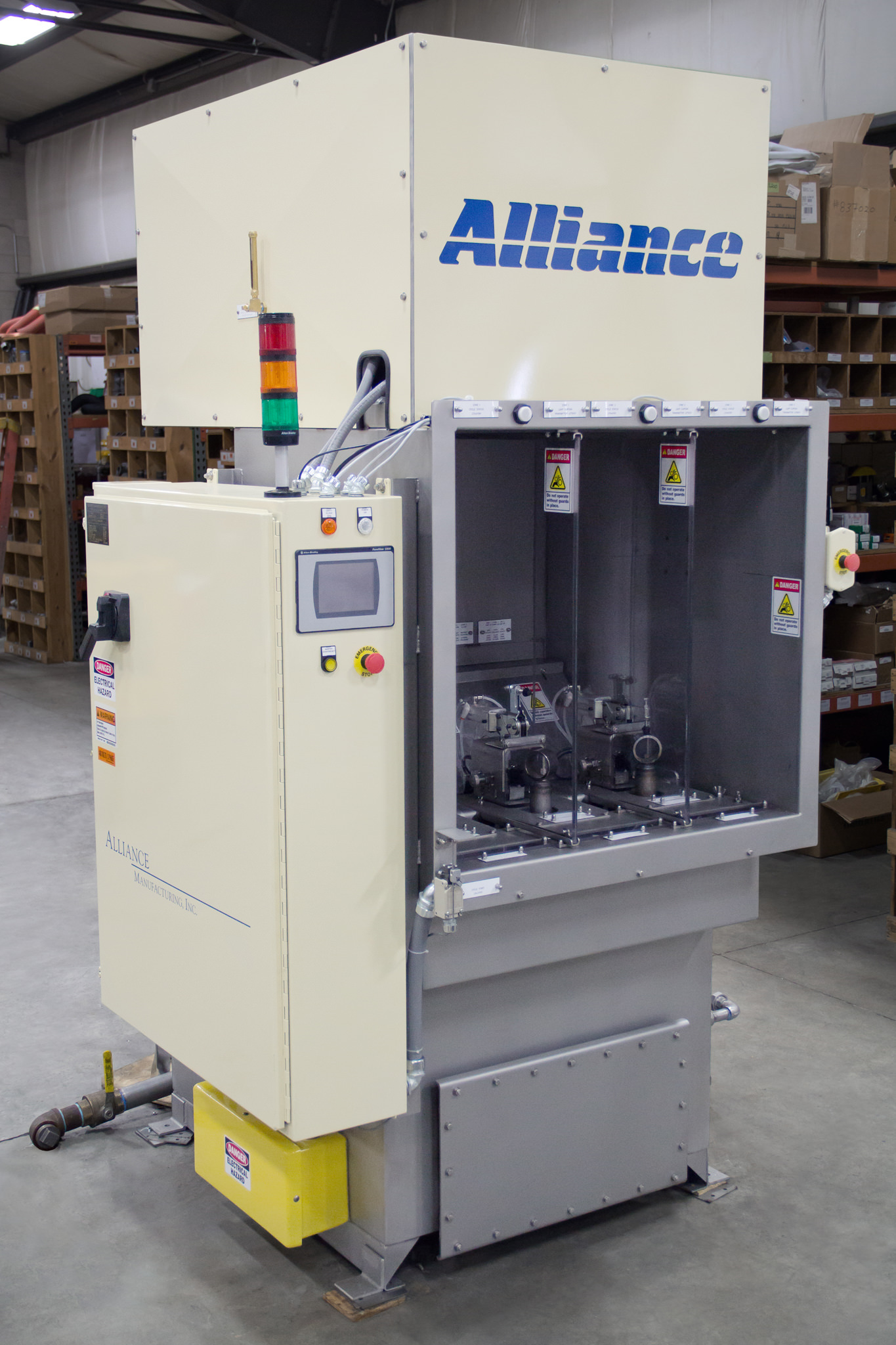 High-pressure tube wash station for automotive manufacturing