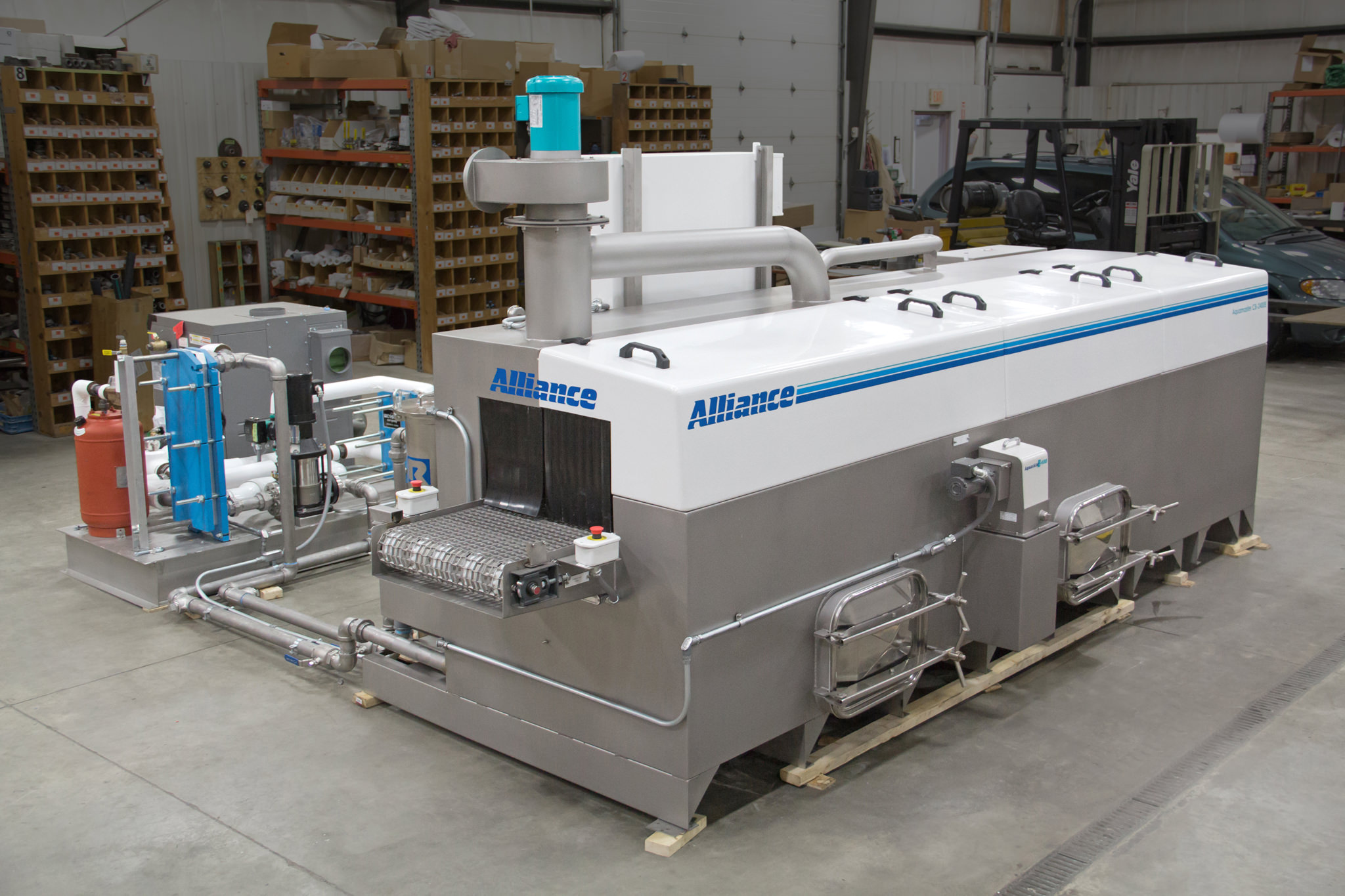 Industrial parts washer for metal handles