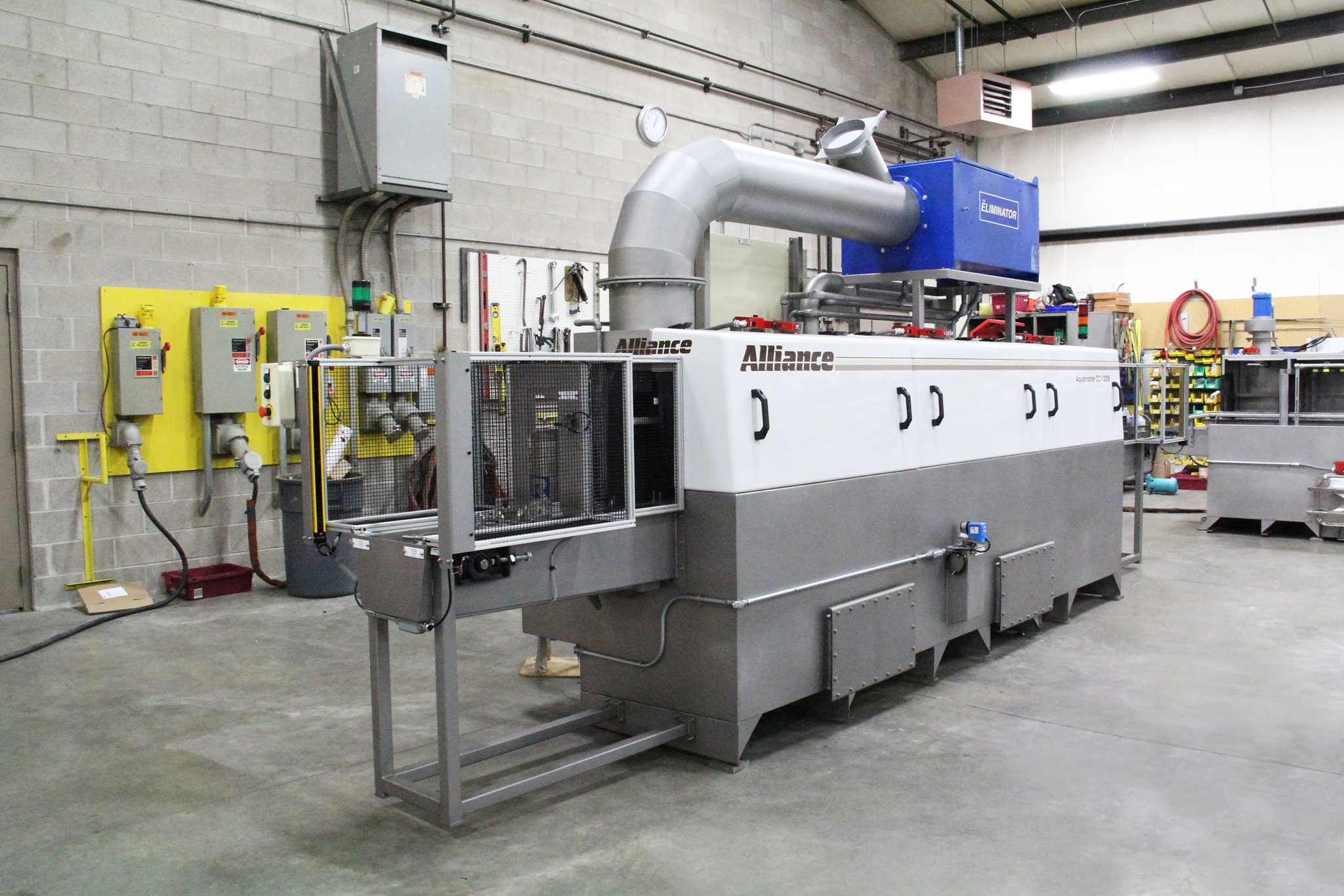 Industrial washer system for General Motors oil pans