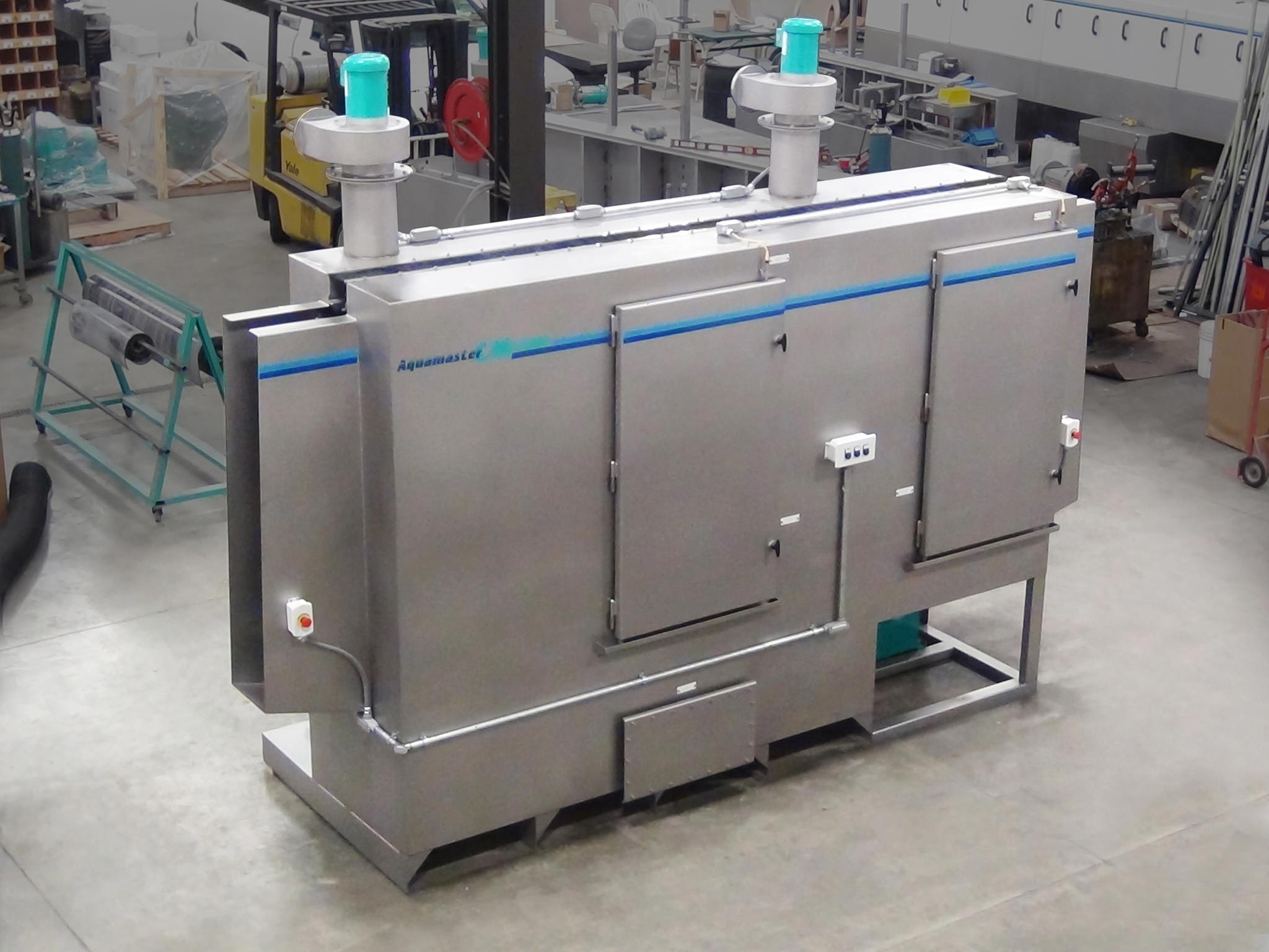 Aquamaster CM-1200E conveyorized monorail cleaning system