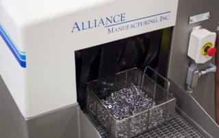 cleaning small parts in baskets