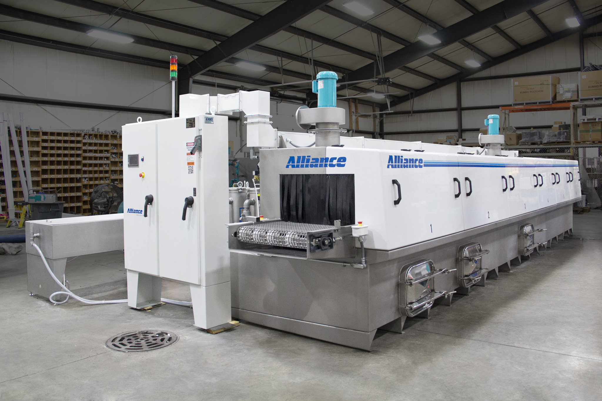 Multi-stage aqueous parts washer for cleaning aluminum, steel, and stainless steel parts 