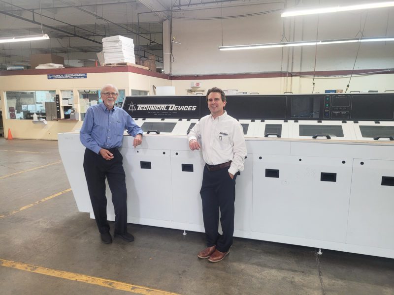 20221017_150056-2048px Doug and Ken standing by TDC machine