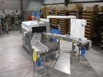 Parts cleaning system with dual conveyors for railroad industry