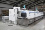 Multi-stage aqueous parts washer for cleaning aluminum, steel, and stainless steel parts 